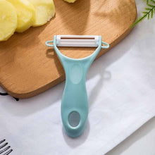 Load image into Gallery viewer, New 1 piece Multi-function Grater Apple peeler Apple  Kitchen Vegetable Carrot Gadgets Fruit Paring knife Double head
