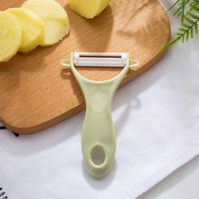 Load image into Gallery viewer, New 1 piece Multi-function Grater Apple peeler Apple  Kitchen Vegetable Carrot Gadgets Fruit Paring knife Double head
